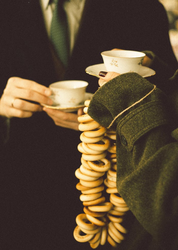 Close-up of a traditional tea ceremony with teacups and bagels in Georgia.